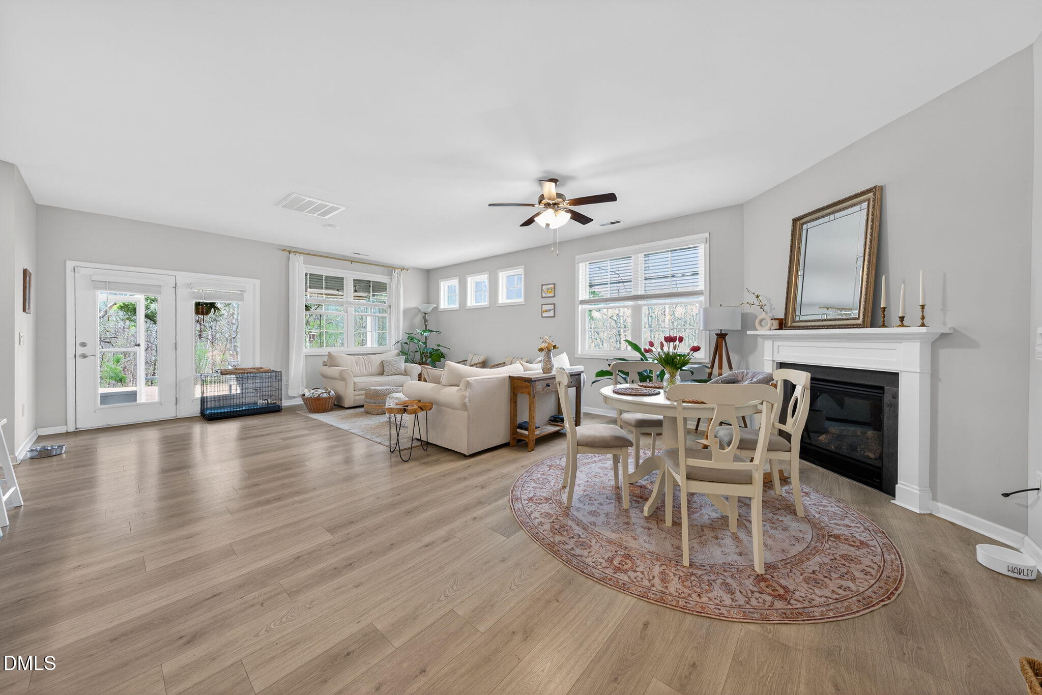1519 Nichols Crk Road Durham, NC 27703 - Photo 8 of 22 a living room with furniture a fireplace and a table