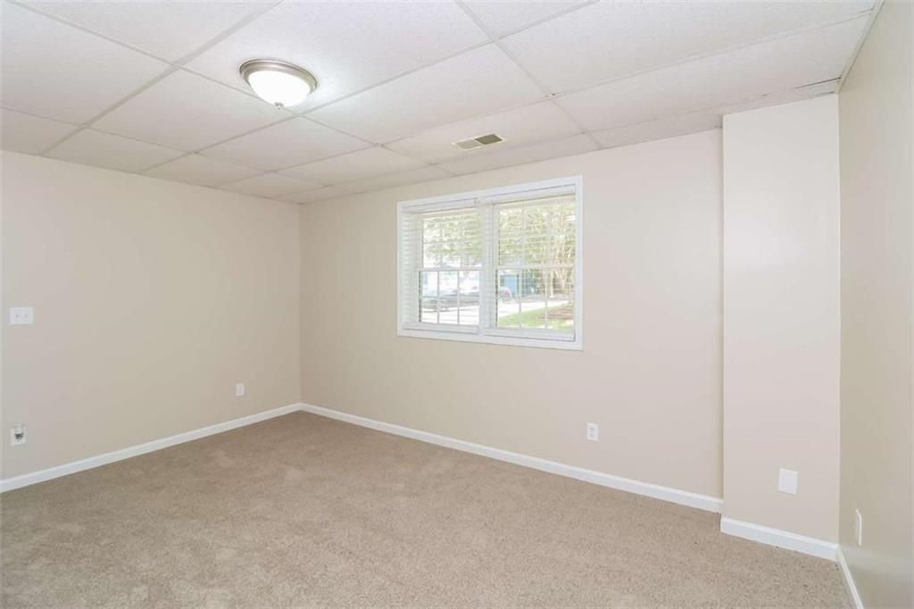 133 Johnstons Way Dallas, GA 30132 - Photo 12 of 15 an empty room with windows