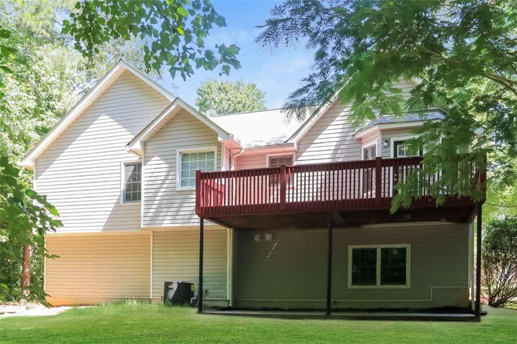 133 Johnstons Way Dallas, GA 30132 - Photo 2 of 15 a view of a house with a yard and potted plants