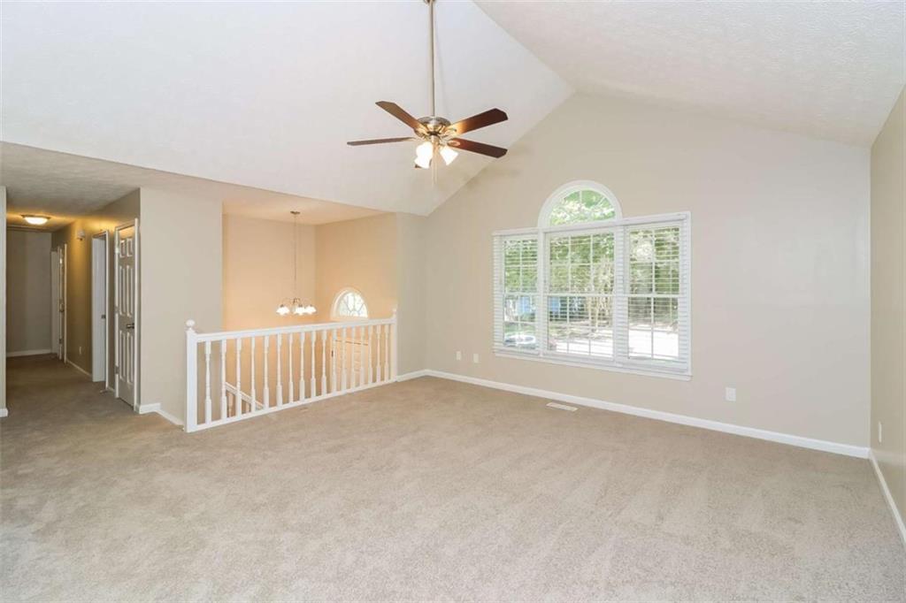 133 Johnstons Way Dallas, GA 30132 - Photo 7 of 15 a view of an empty room with a window