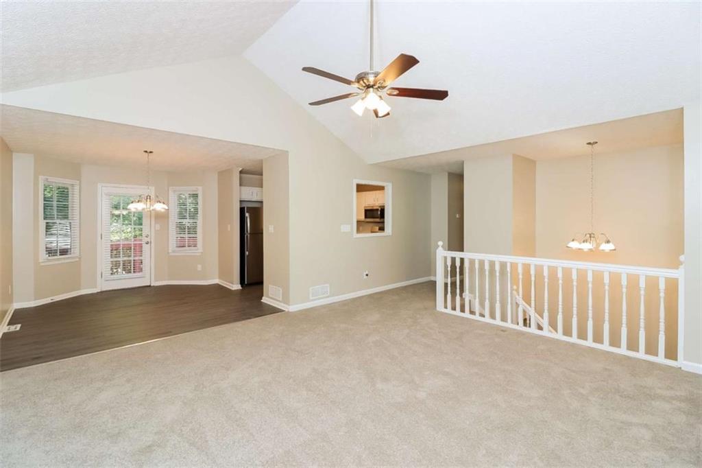 133 Johnstons Way Dallas, GA 30132 - Photo 8 of 15 a view of a livingroom with a ceiling fan and window