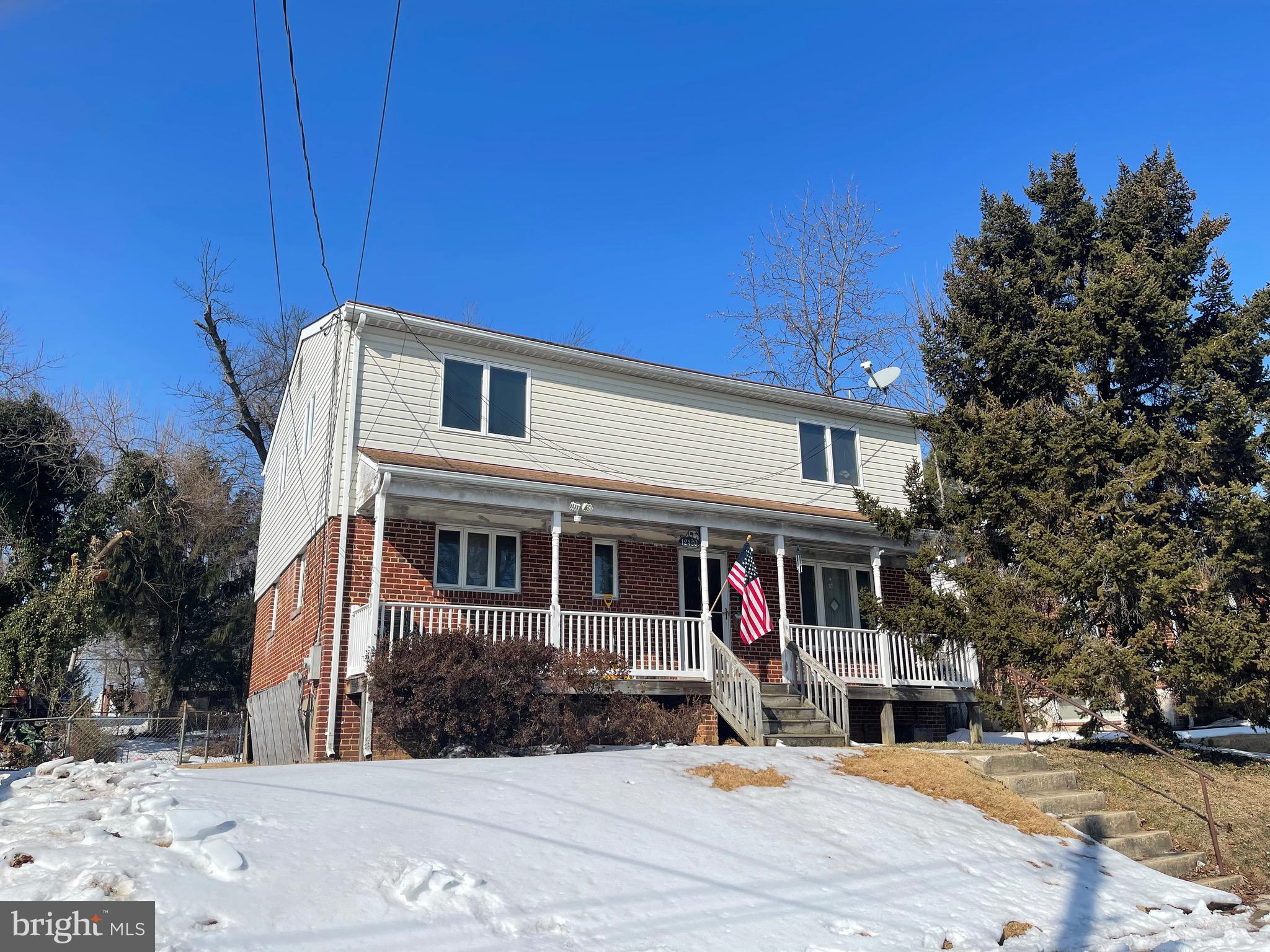12420 Feldon Street Silver Spring, MD 20906 - Photo 2 of 33 a front view of a house with a patio