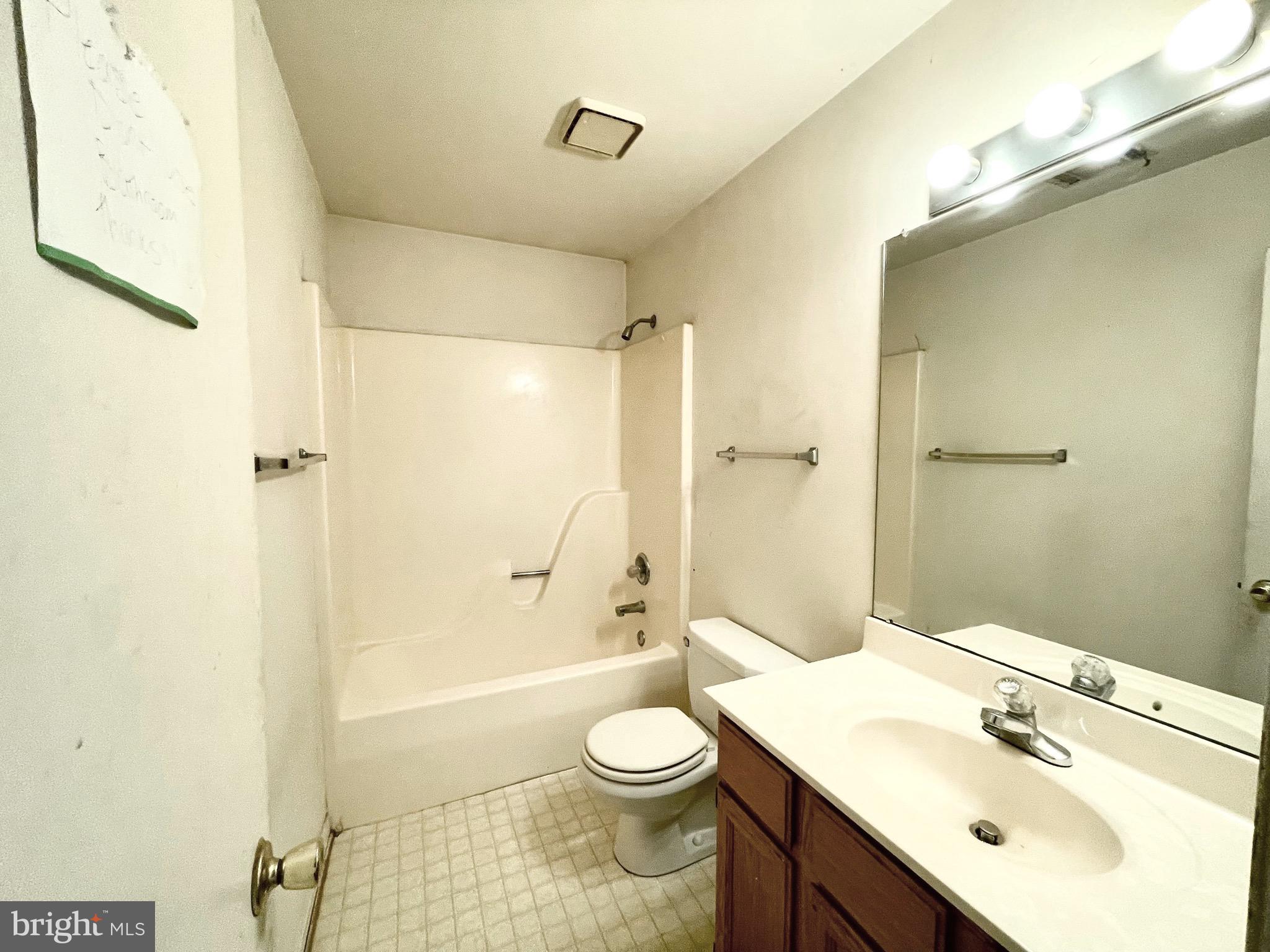 12420 Feldon Street Silver Spring, MD 20906 - Photo 21 of 33 a bathroom with a sink a toilet and shower