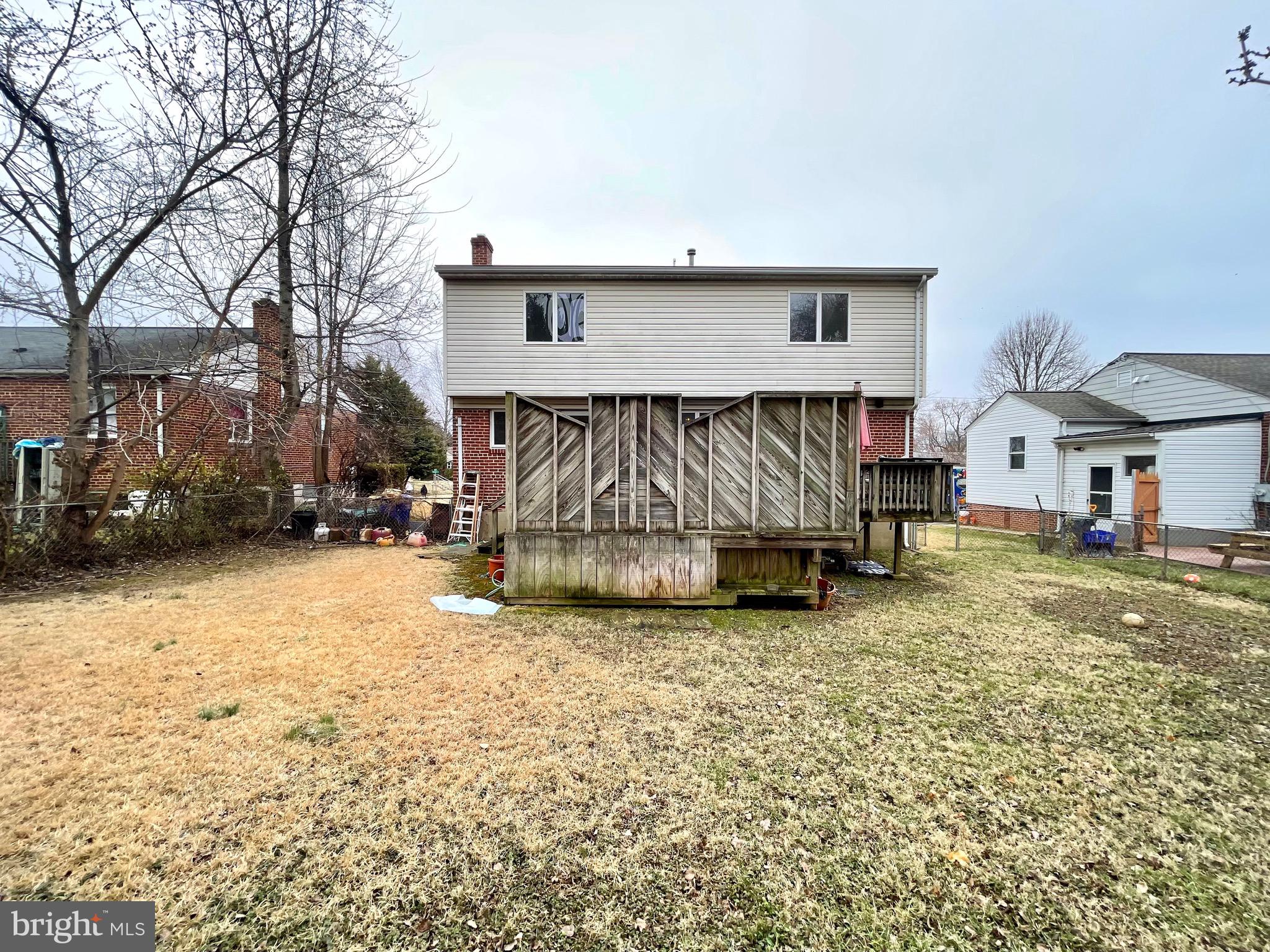 12420 Feldon Street Silver Spring, MD 20906 - Photo 32 of 33 a view of house with yard and sitting area