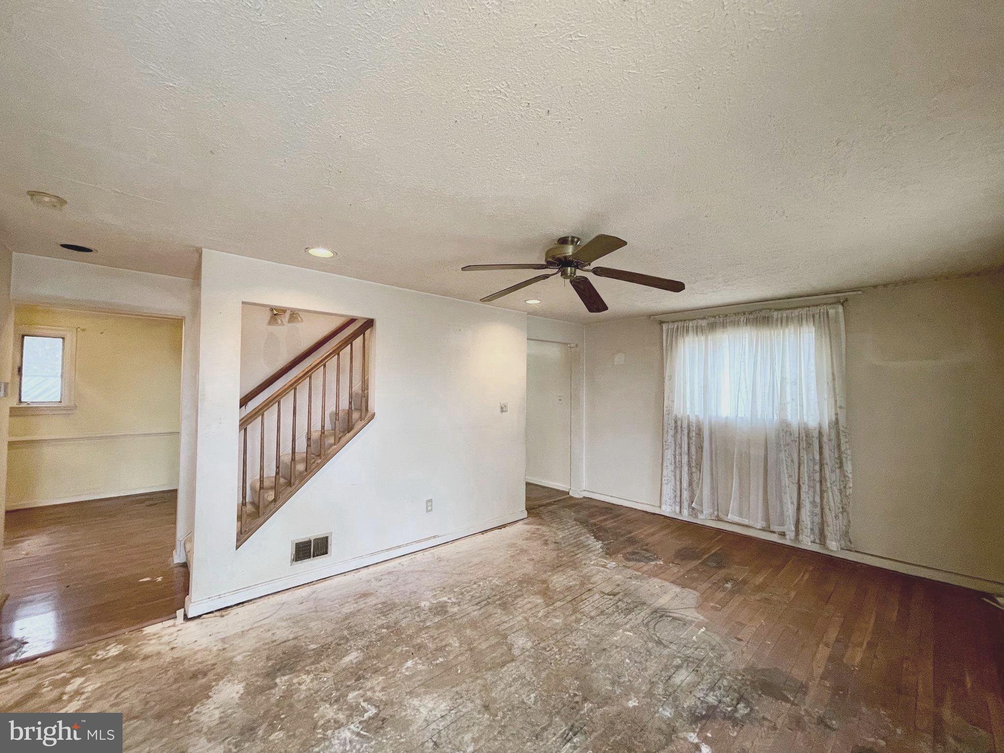 12420 Feldon Street Silver Spring, MD 20906 - Photo 5 of 33 a view of a hallway with staircase