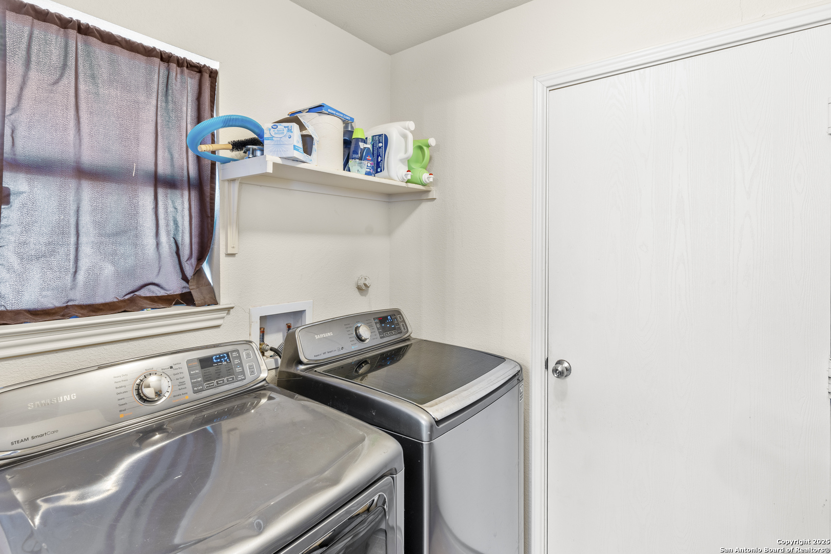 3917 Whisper Ridge Schertz, TX 78108 - Photo 12 of 27 a utility room with dryer and washer