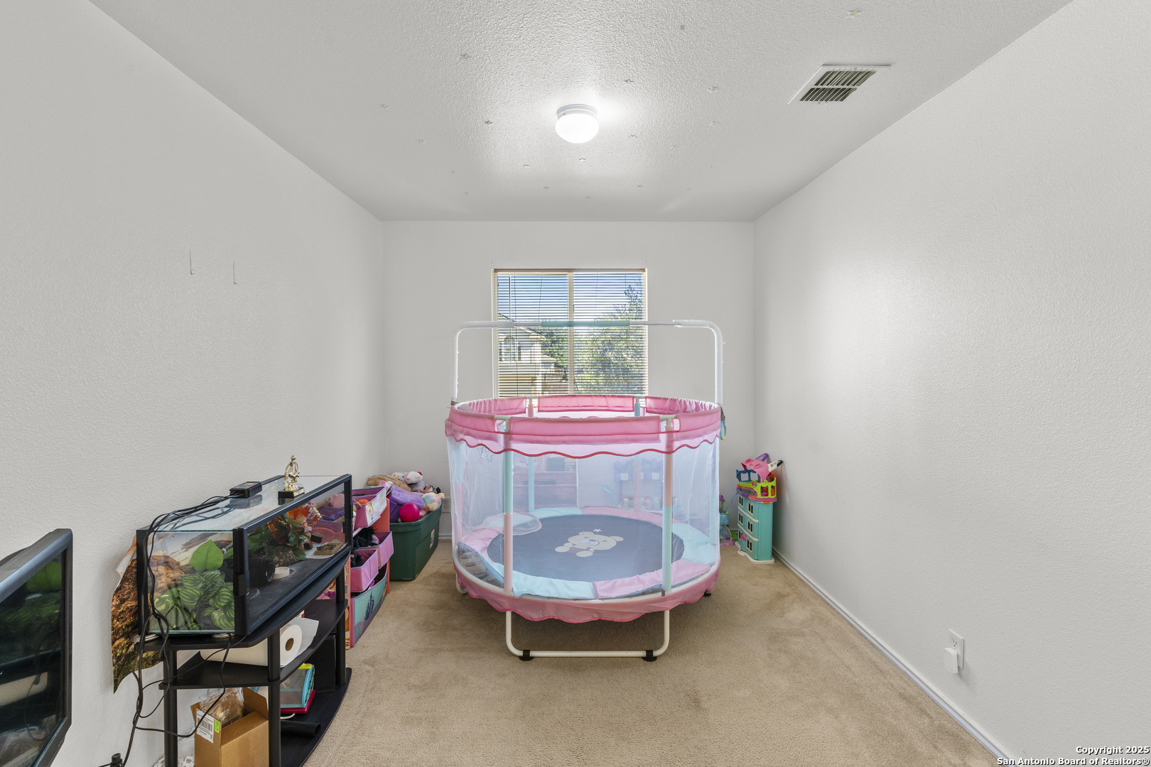 3917 Whisper Ridge Schertz, TX 78108 - Photo 15 of 27 a room with furniture and window