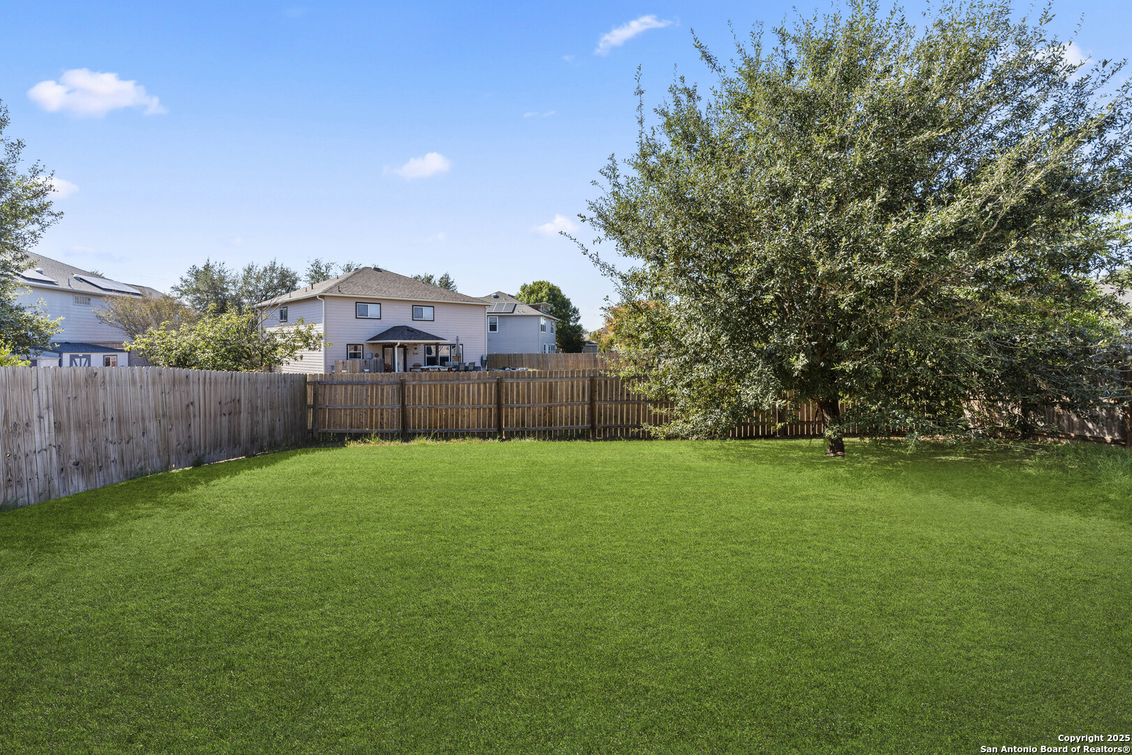 3917 Whisper Ridge Schertz, TX 78108 - Photo 27 of 27 a view of a backyard with green space