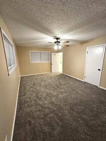 a view of balcony with wooden floor