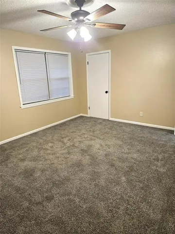 a bathroom with a tub and a shower