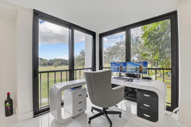 a bathroom with a toilet a sink and a mirror