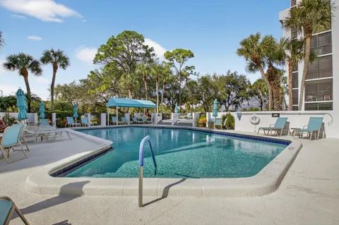 a room with furniture and a flat screen tv
