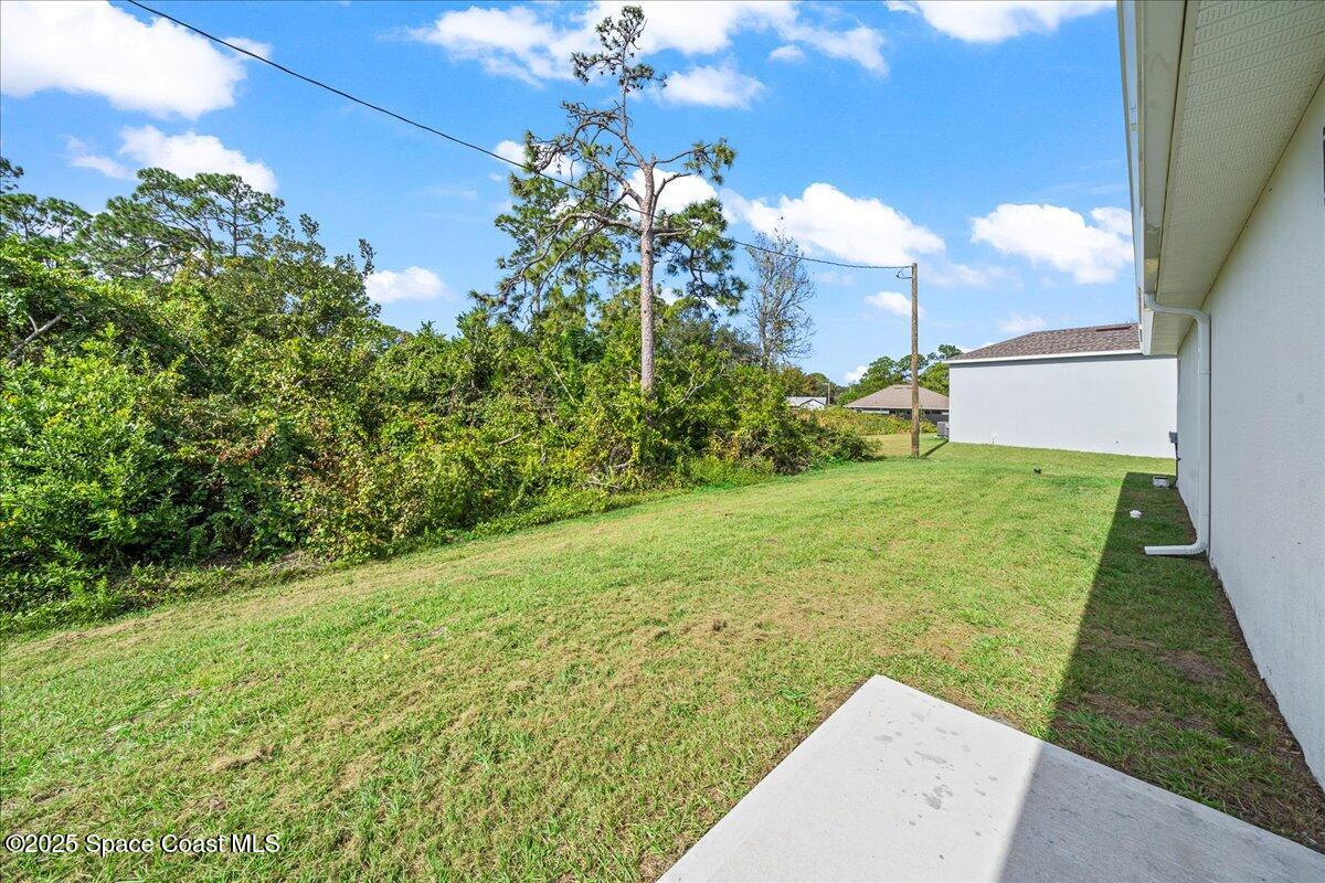 1401 Wilder Road Palm Bay, FL 32909 - Photo 19 of 21 a view of yard with swimming pool