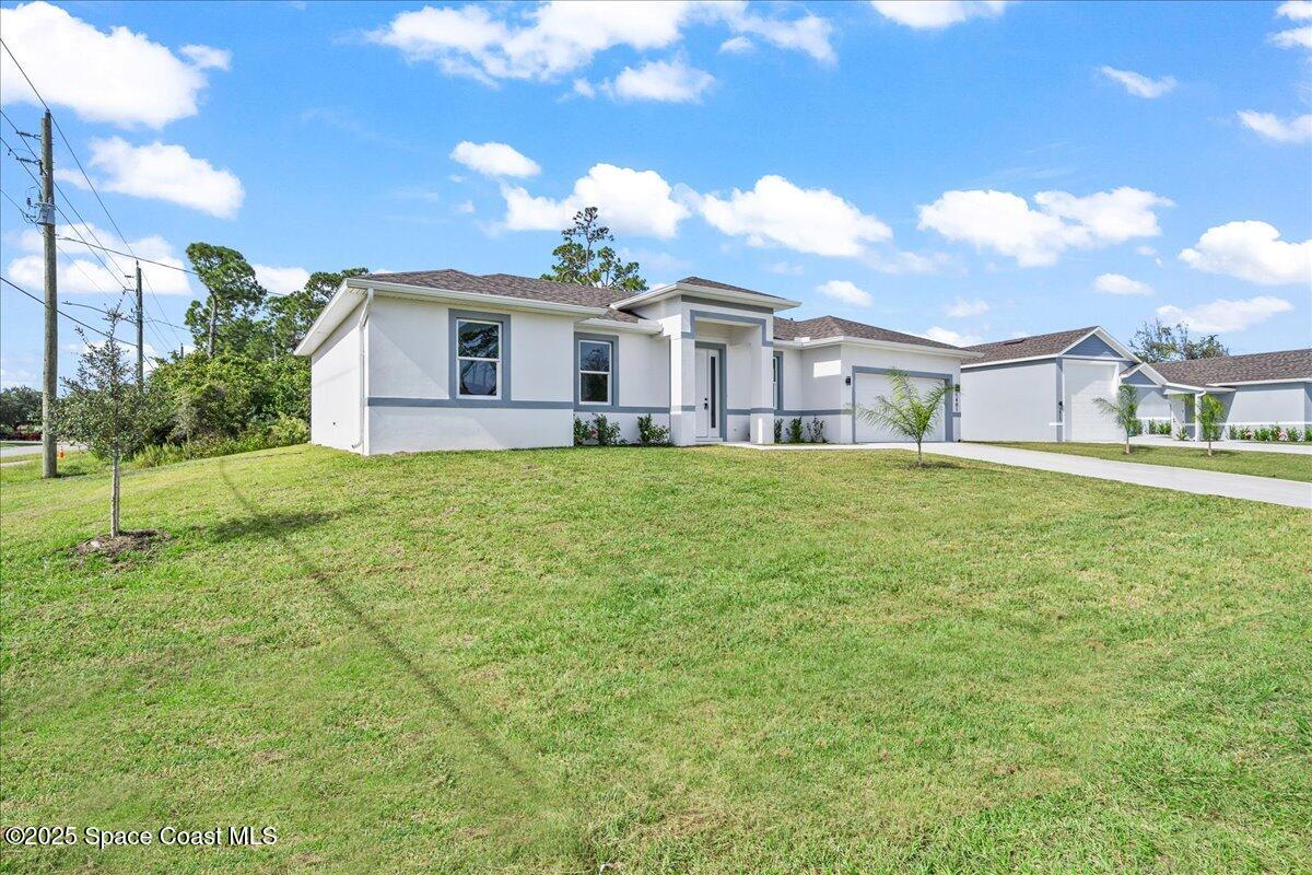 1401 Wilder Road Palm Bay, FL 32909 - Photo 21 of 21 a view of a yard in front of the house