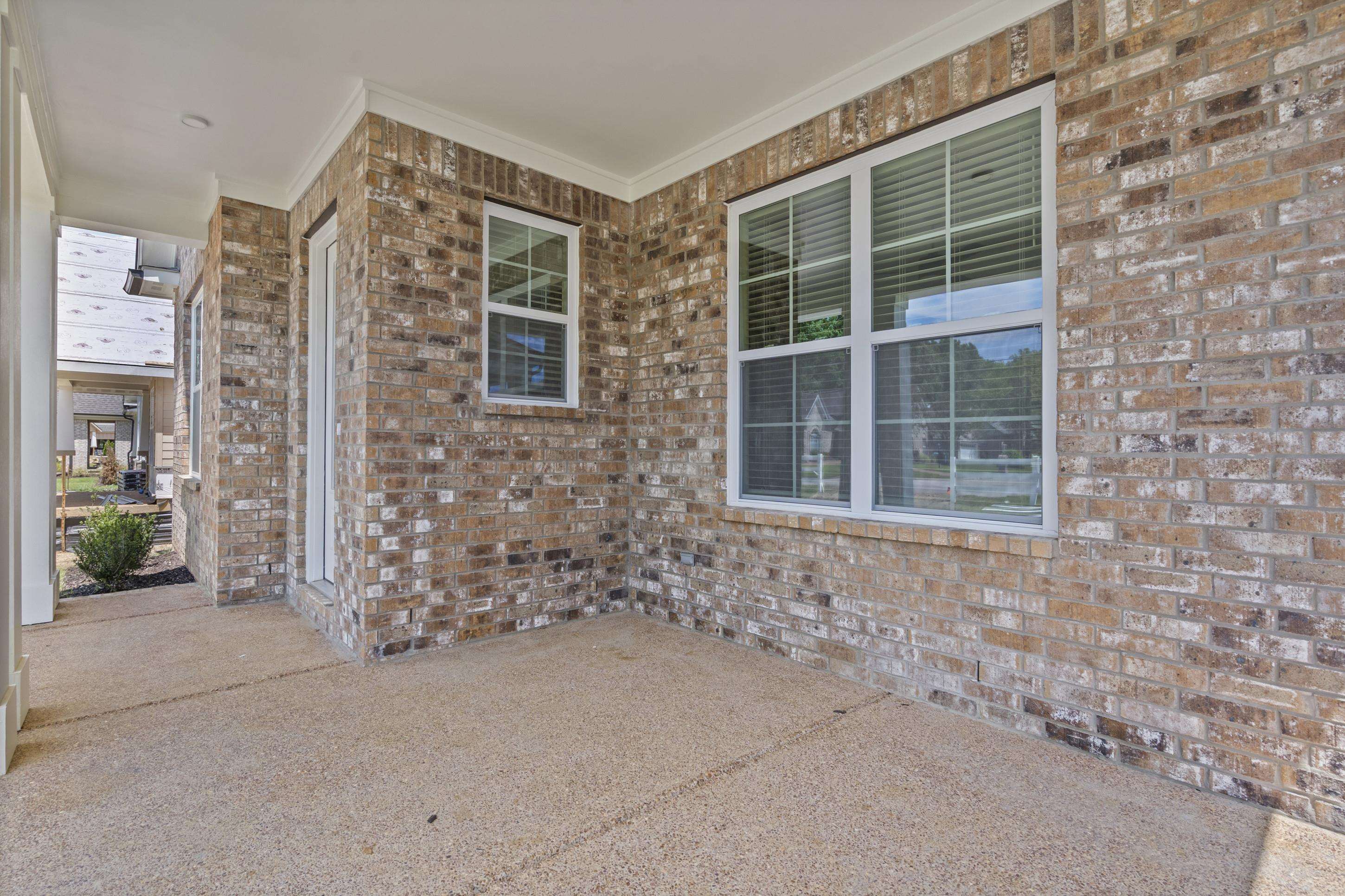 5702 Gerber Road Arlington, TN 38002 - Photo 23 of 27 Spacious covered patio area featuring a brick exterior facade
