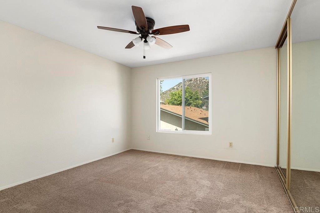 10281 Alphonse Street Santee, CA 92071 - Photo 17 of 26 an empty room with a window