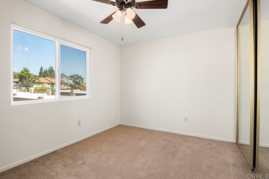10281 Alphonse Street Santee, CA 92071 - Photo 21 of 26 a view of an empty room with a window