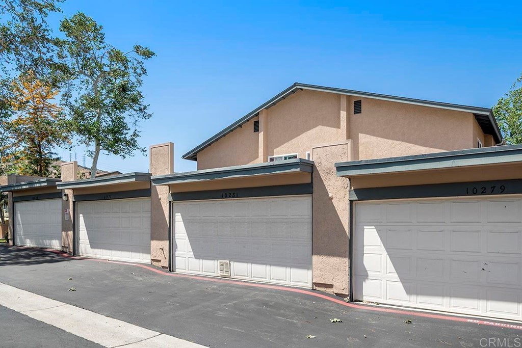 10281 Alphonse Street Santee, CA 92071 - Photo 22 of 26 a view of a house with a garage