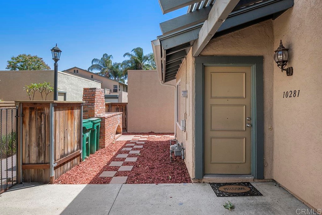10281 Alphonse Street Santee, CA 92071 - Photo 4 of 26 a view of an entryway door