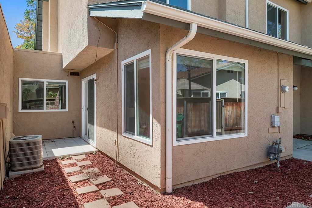 10281 Alphonse Street Santee, CA 92071 - Photo 5 of 26 a view of a brick house with windows