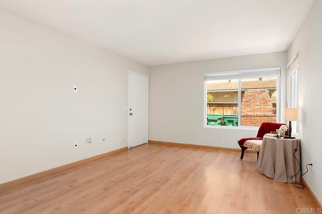 10281 Alphonse Street Santee, CA 92071 - Photo 6 of 26 a living room with furniture and windows