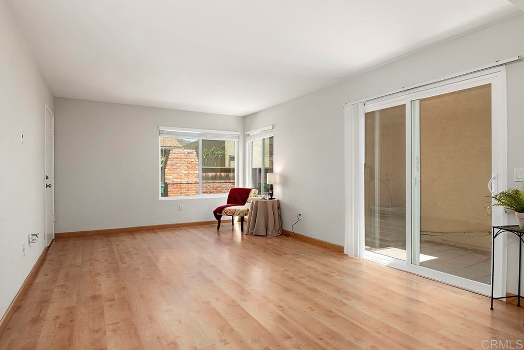 10281 Alphonse Street Santee, CA 92071 - Photo 7 of 26 wooden floor in an empty room with a window