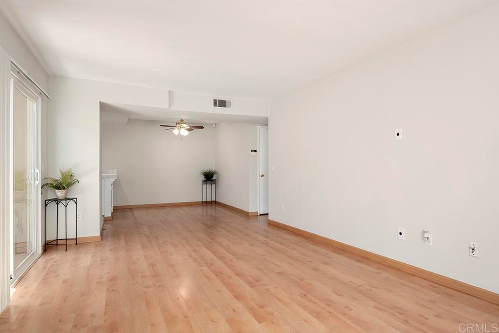 10281 Alphonse Street Santee, CA 92071 - Photo 9 of 26 a view of empty room with wooden floor