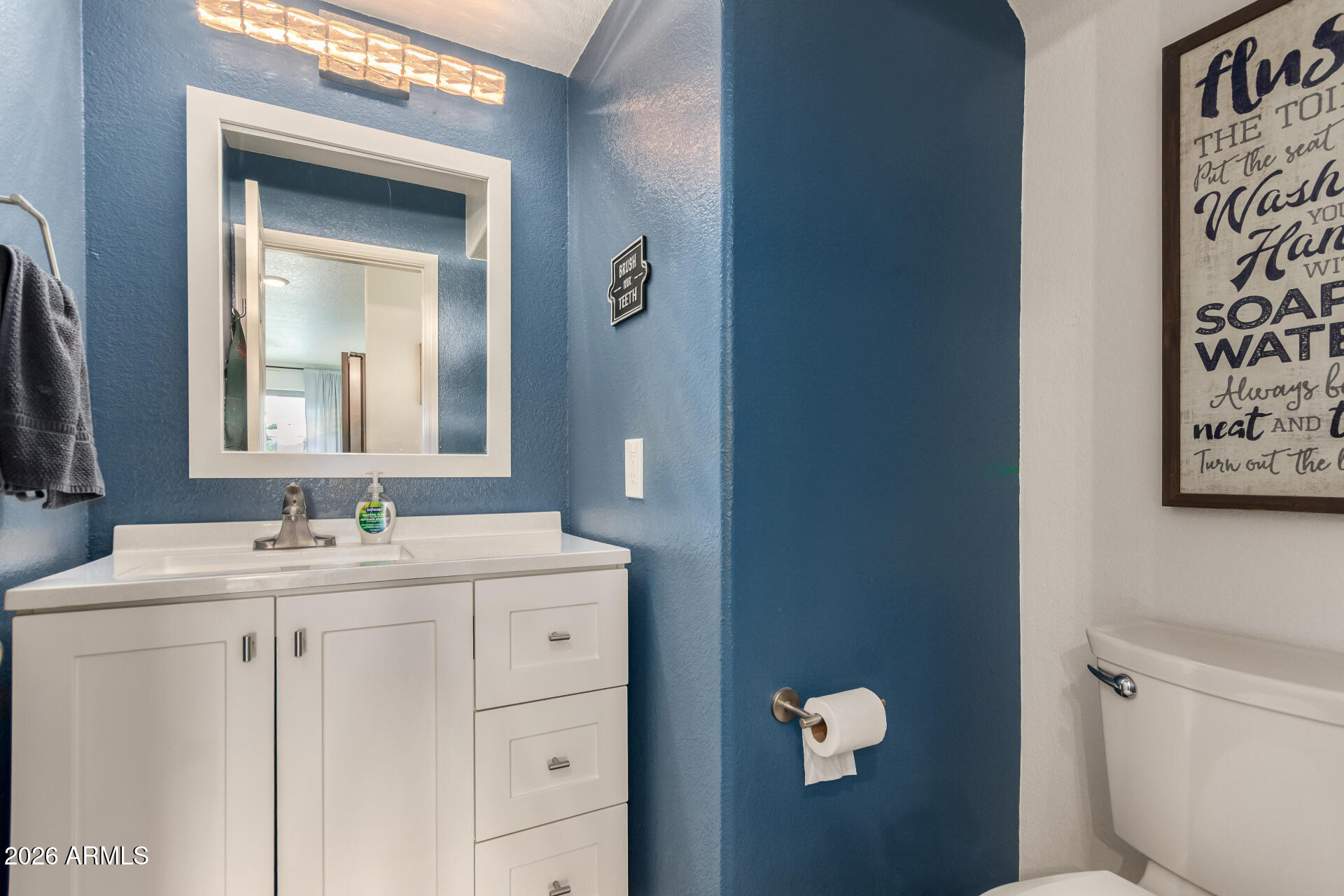 1727 East Aspen Way Gilbert, AZ 85234 - Photo 10 of 18 first floor half bath