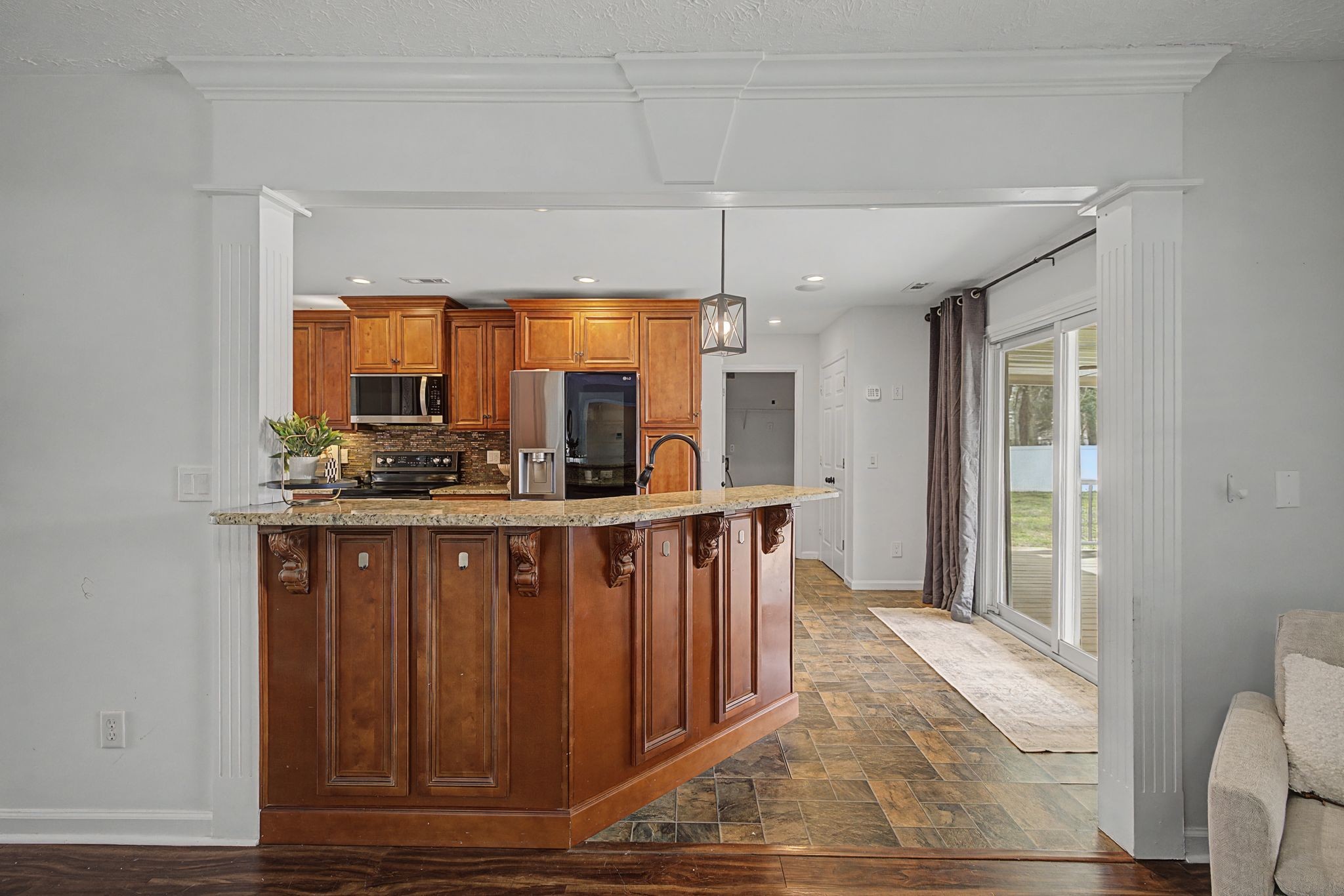 1123 Bramble Trail Murfreesboro, TN 37129 - Photo 13 of 41 a view of kitchen with wooden floor