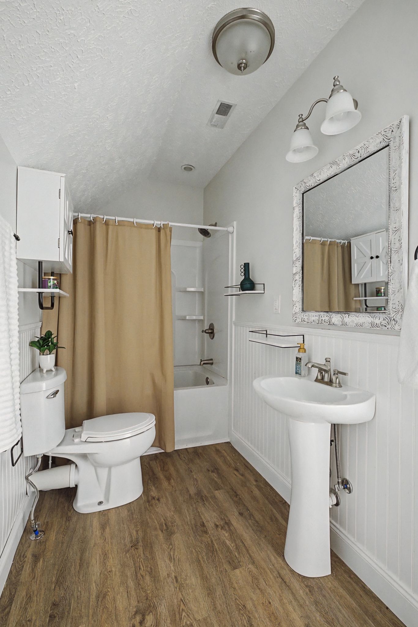 1123 Bramble Trail Murfreesboro, TN 37129 - Photo 30 of 41 a bathroom with a sink toilet a mirror and shower