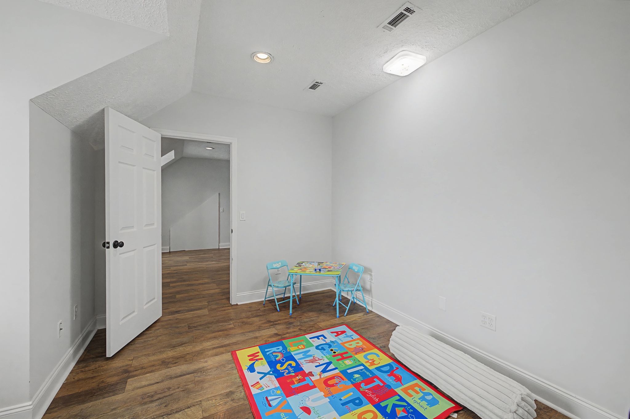 1123 Bramble Trail Murfreesboro, TN 37129 - Photo 31 of 41 a room with furniture and a wooden floor
