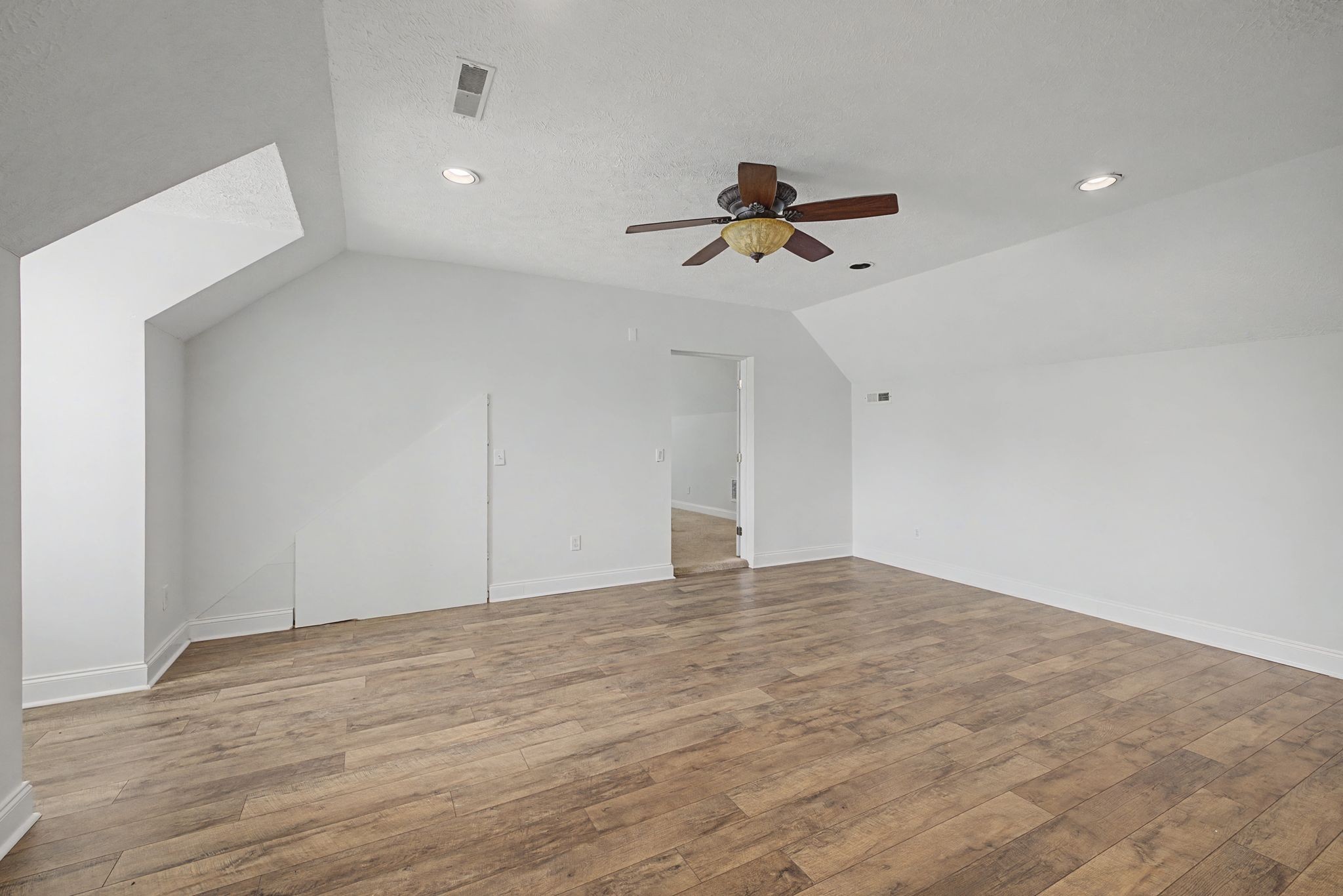 1123 Bramble Trail Murfreesboro, TN 37129 - Photo 33 of 41 a view of empty room with wooden floor and ceiling fan