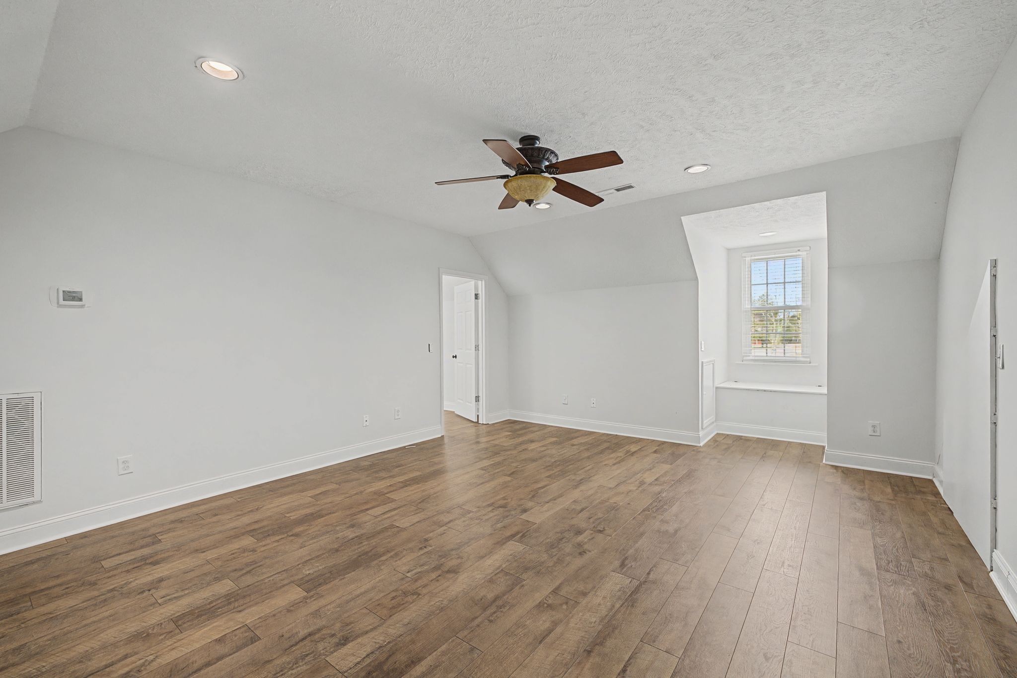 1123 Bramble Trail Murfreesboro, TN 37129 - Photo 34 of 41 a view of empty room with wooden floor and fan