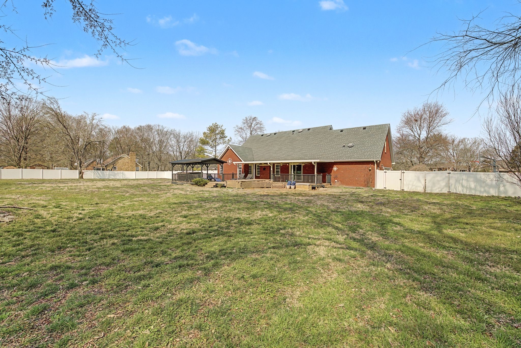1123 Bramble Trail Murfreesboro, TN 37129 - Photo 39 of 41 a view of a large pool with lawn chairs under an umbrella