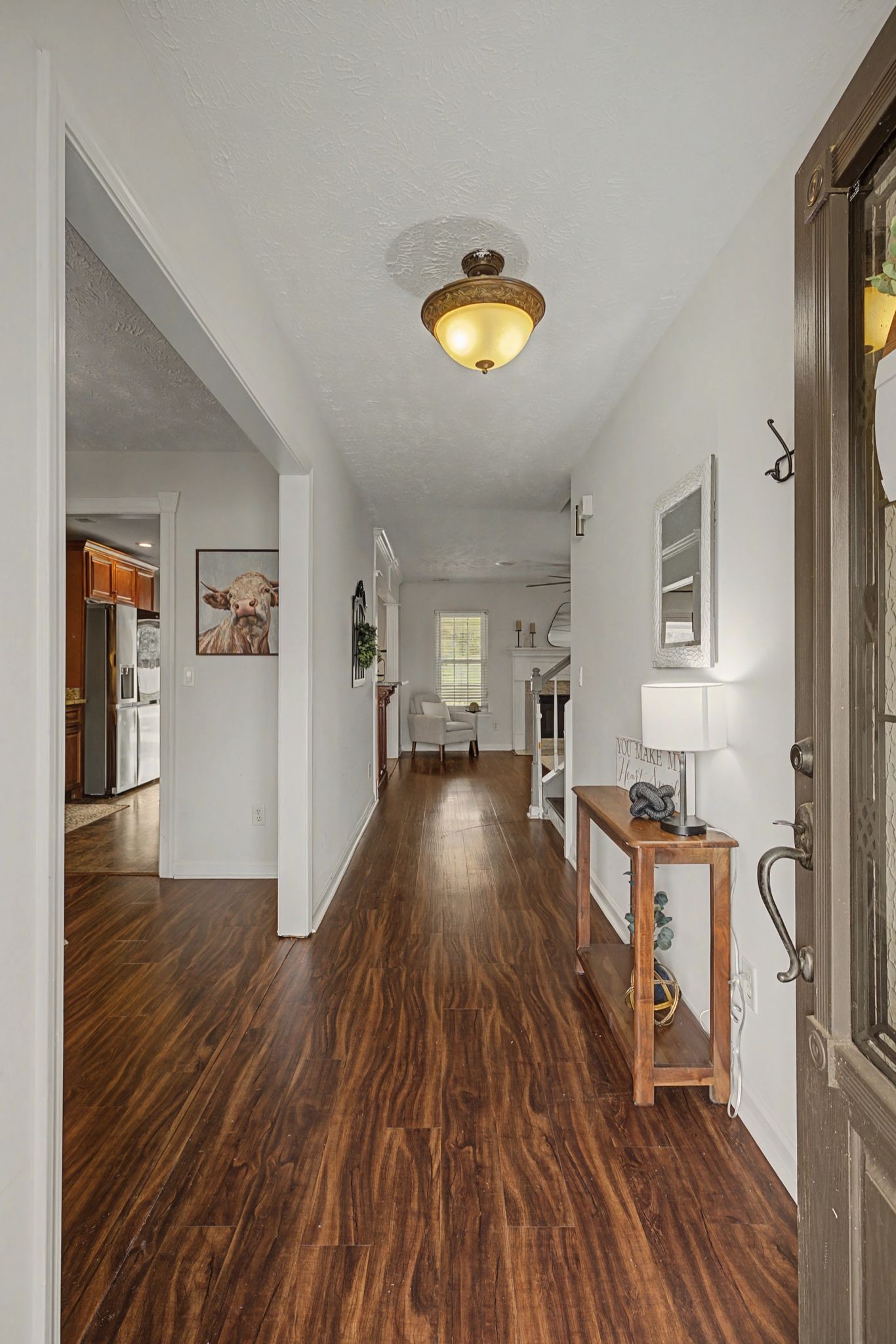 1123 Bramble Trail Murfreesboro, TN 37129 - Photo 6 of 41 a view of a living room and a wooden floor