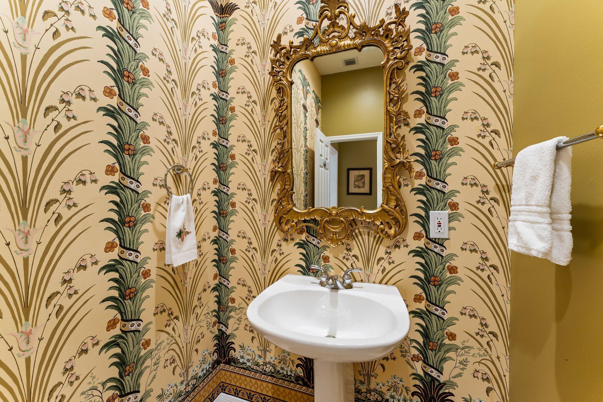 248 River Drive Tequesta, FL 33469 - Photo 51 of 65 a bathroom with a sink and a mirror