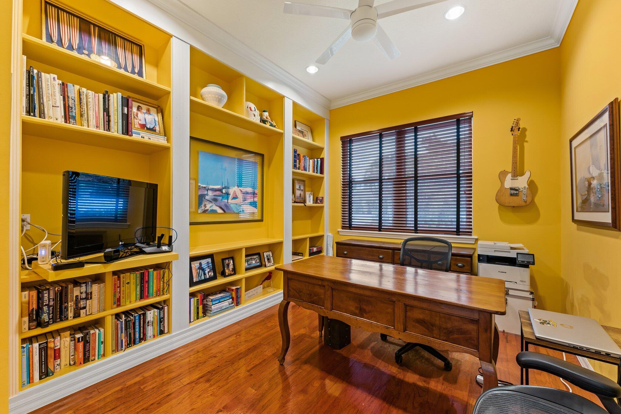 248 River Drive Tequesta, FL 33469 - Photo 10 of 65 a living room with furniture and a flat screen tv