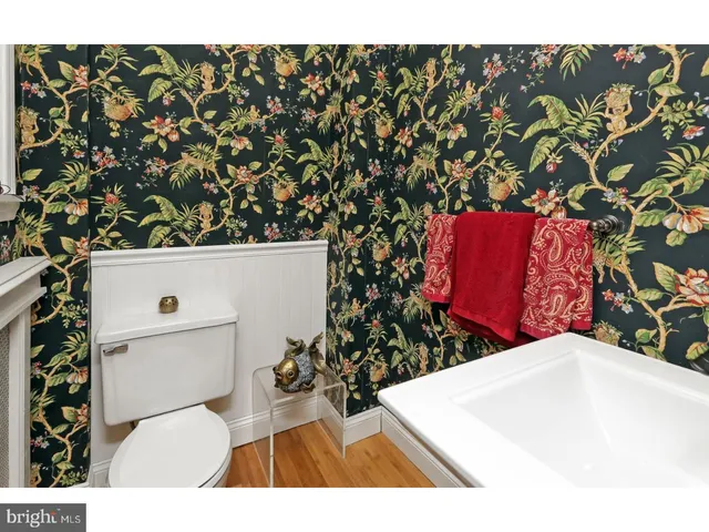 a kitchen with stainless steel appliances granite countertop a stove a refrigerator and a microwave