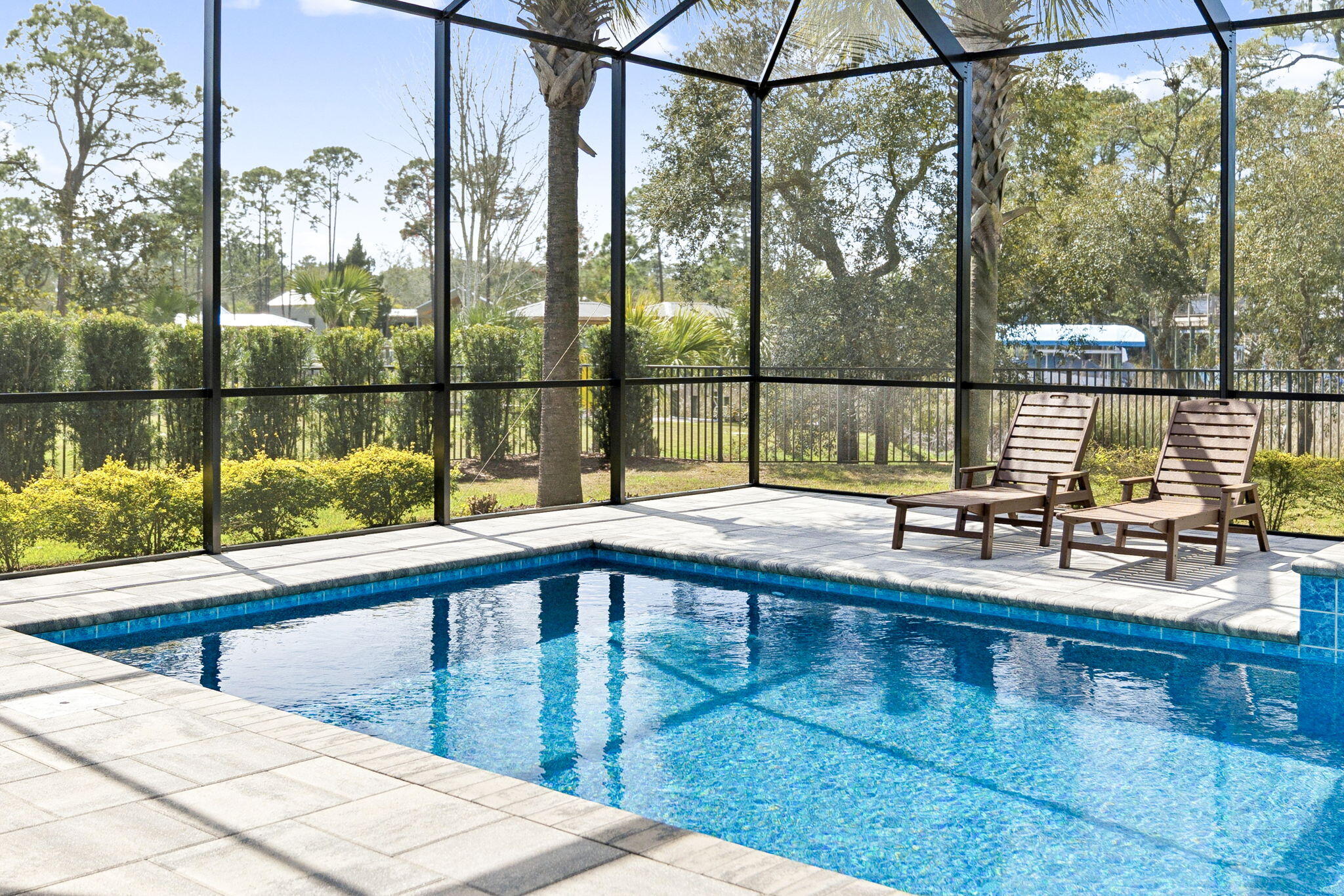 153 Blue Bell Circle Santa Rosa Beach, FL 32459 - Photo 2 of 18 a swimming pool view from a balcony
