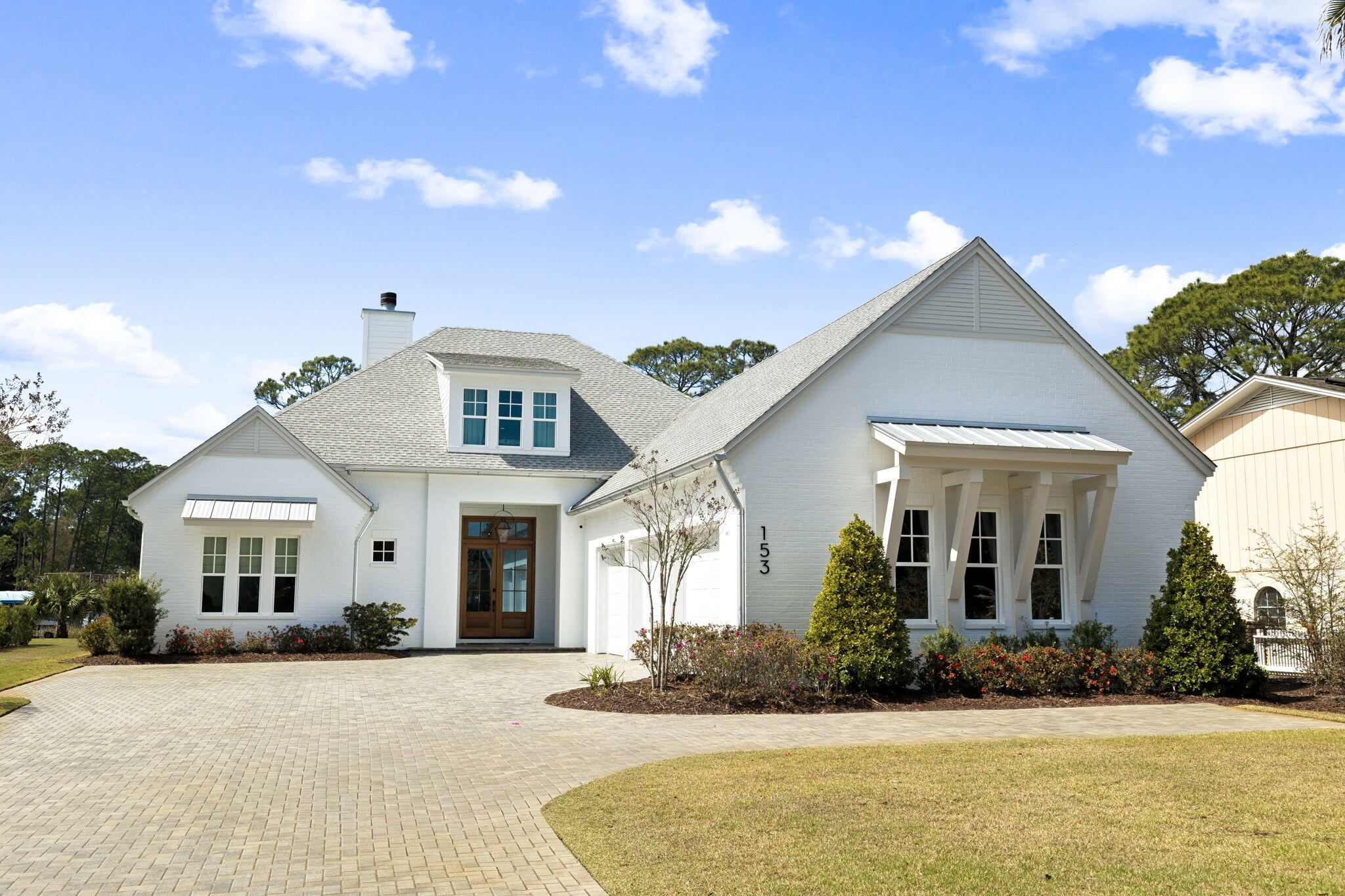 153 Blue Bell Circle Santa Rosa Beach, FL 32459 - Photo 6 of 18 a front view of a house with a yard