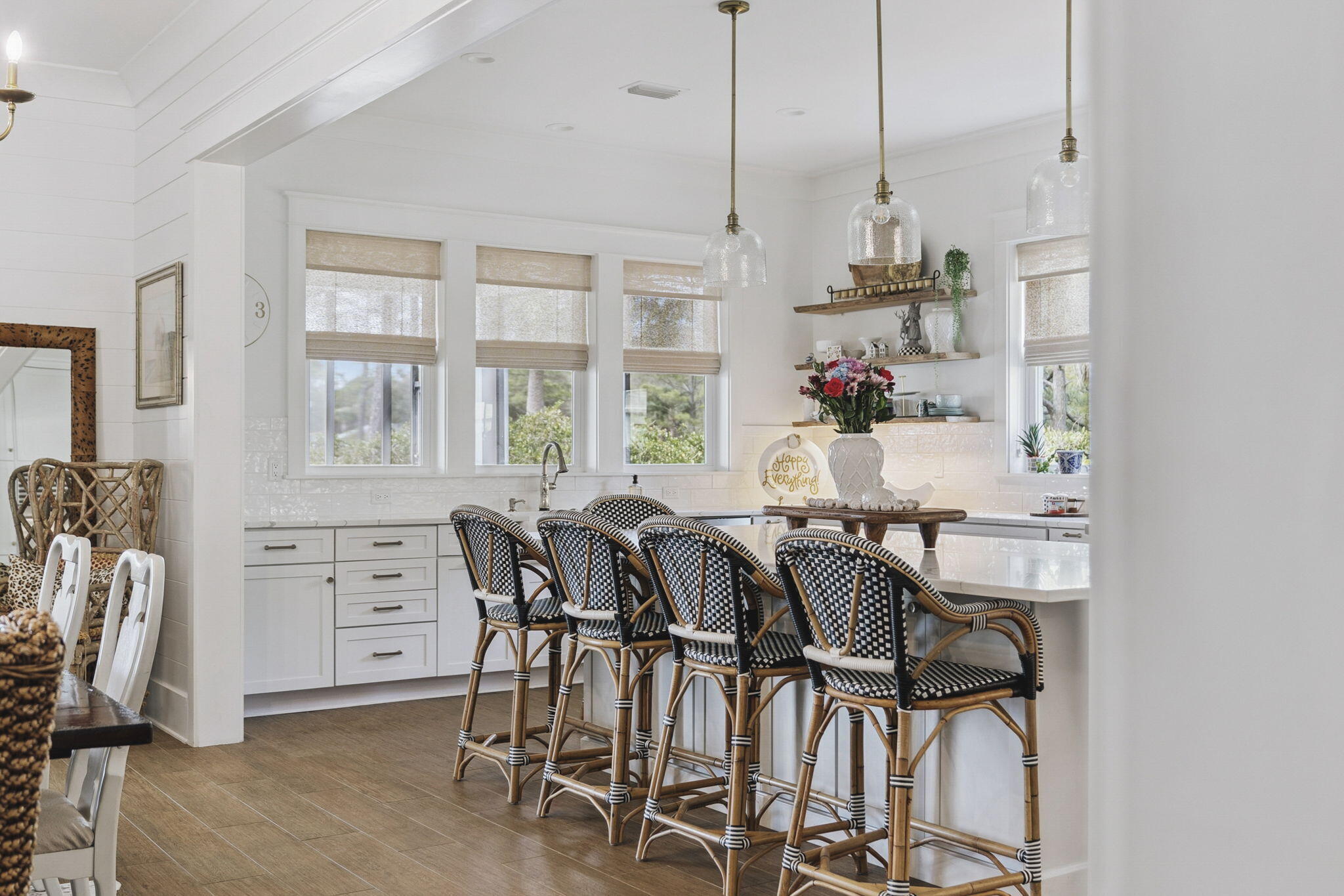 153 Blue Bell Circle Santa Rosa Beach, FL 32459 - Photo 10 of 18 a view of a dining room with furniture and windows