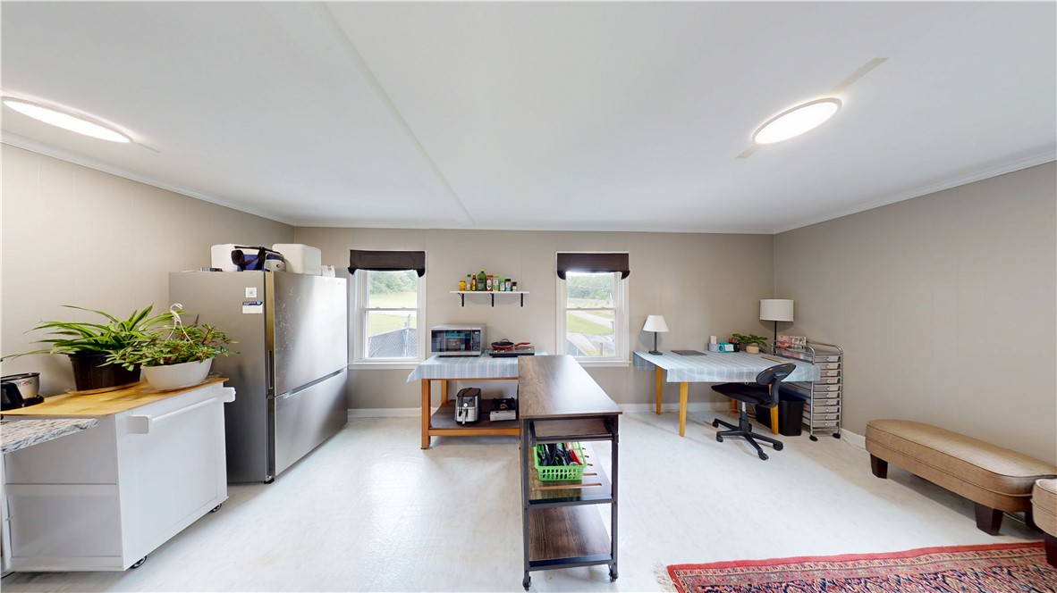 415 Church Street Pendleton, SC 29670 - Photo 20 of 35 Functional kitchen workspace offers practical amenities and bright illumination.