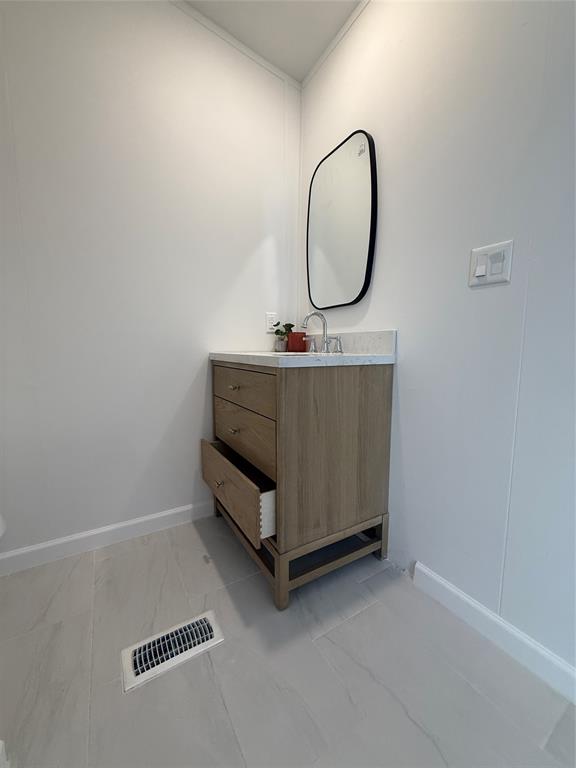 835 Private Road 4732 Rhome, TX 76078 - Photo 20 of 30 a room with a bed and a mirror