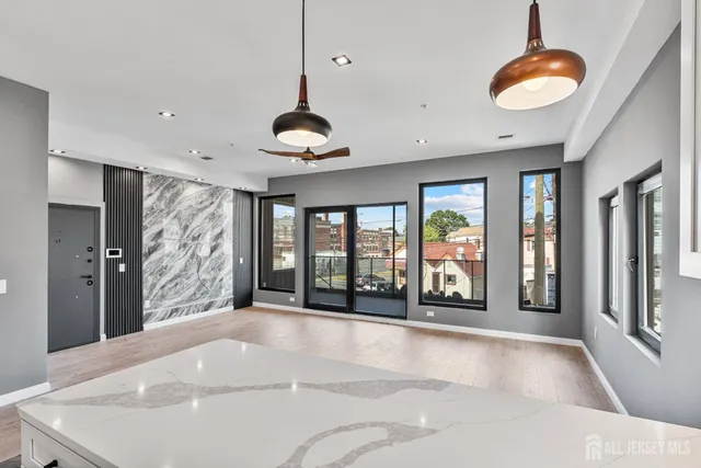 a view of an entryway with a livingroom