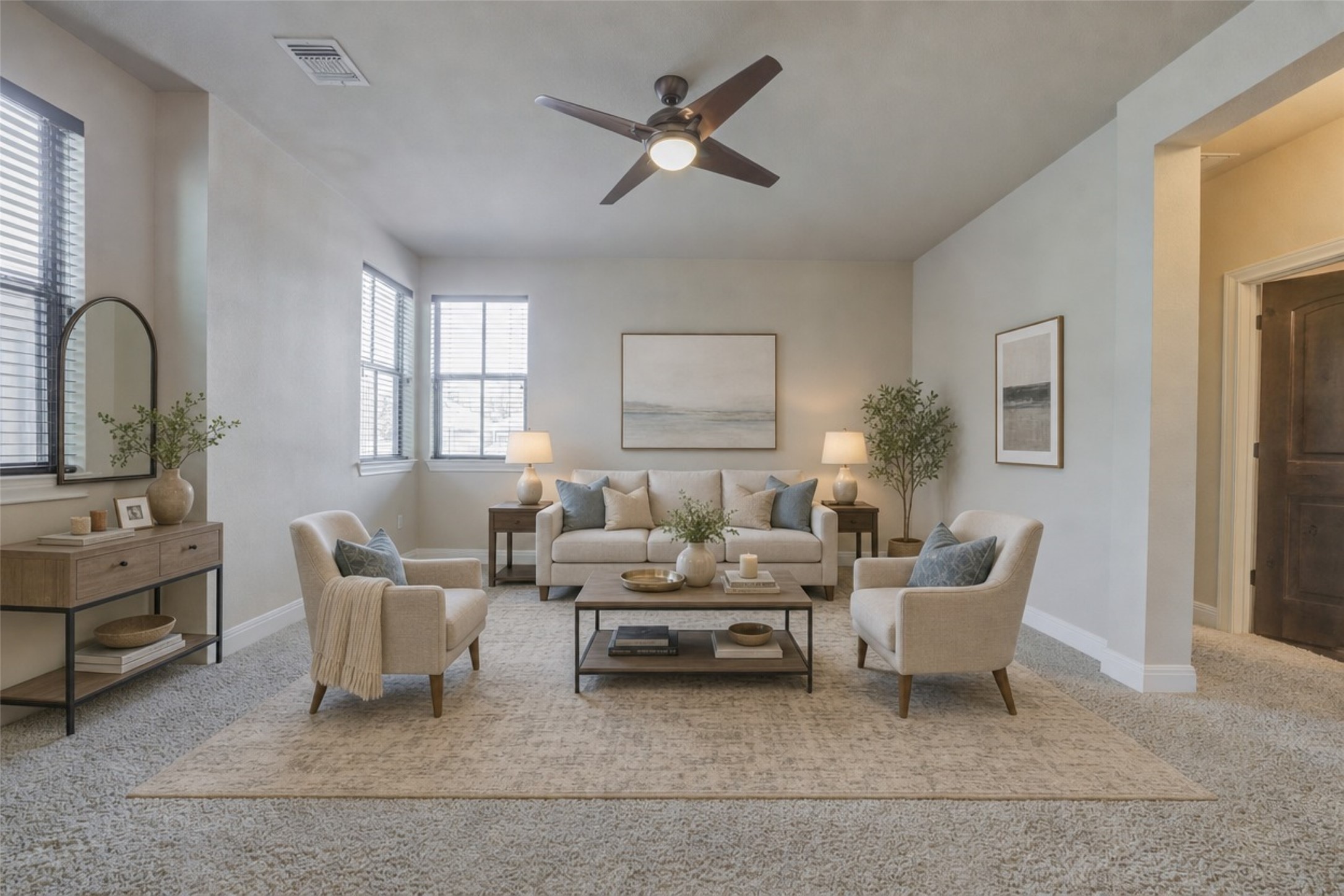 4524 Berkman Drive Austin, TX 78723 - Photo 5 of 38 Light-filled living area featuring carpet flooring, multiple windows with blinds, a ceiling fan with integrated lighting, and neutral wall tones