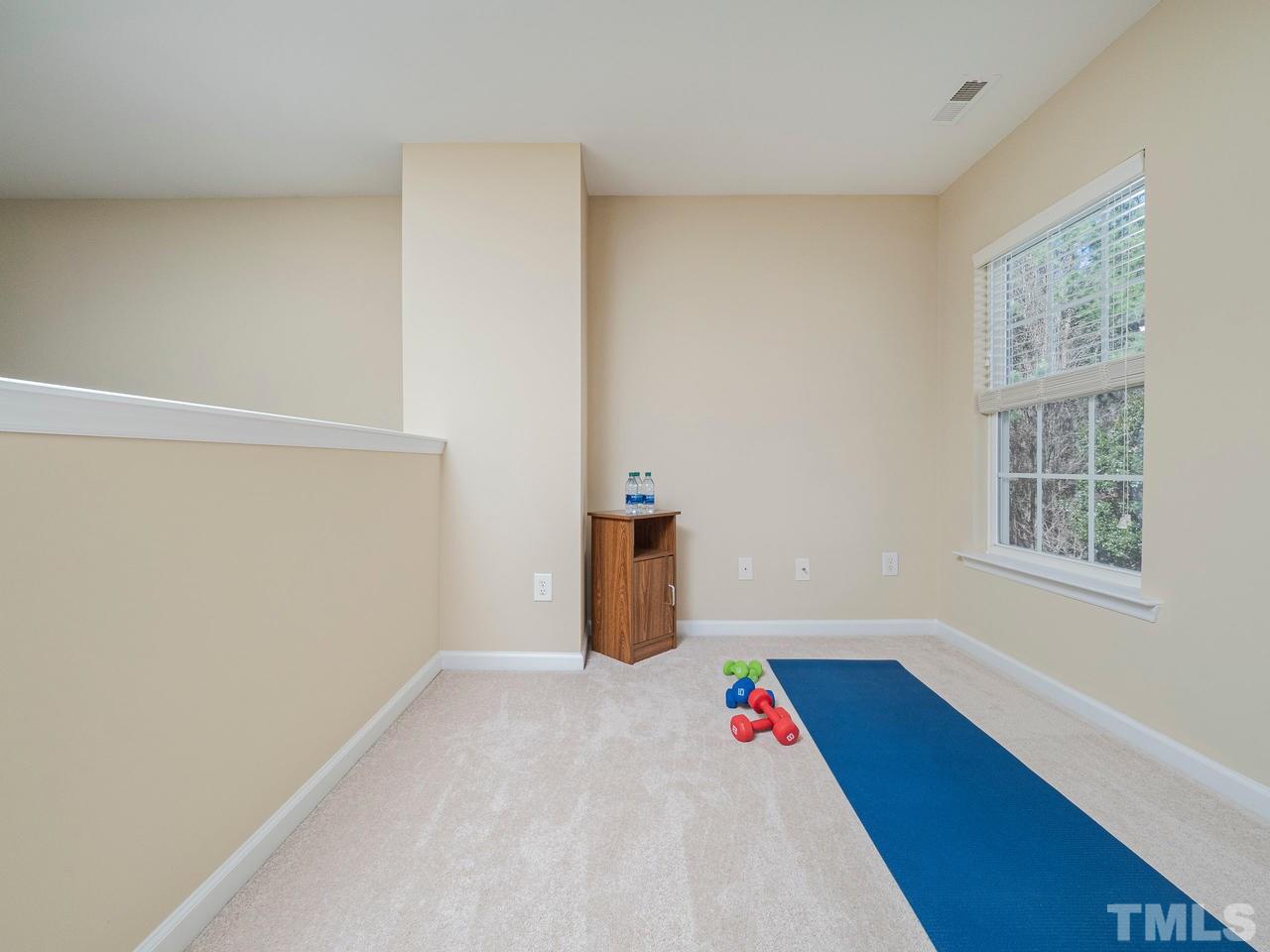 8429 Whisper Ridge Place Raleigh, NC 27613 - Photo 18 of 27 This loft offers a lot of possibilities... work out area, man cave space, office area, you name it!