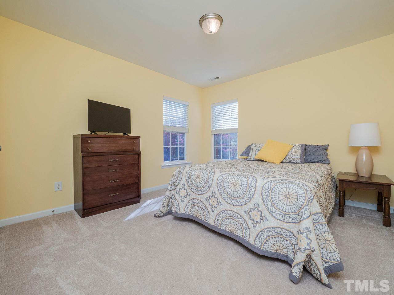 8429 Whisper Ridge Place Raleigh, NC 27613 - Photo 19 of 27 Each of the additional bedrooms easily acommodate a queen sized bed!