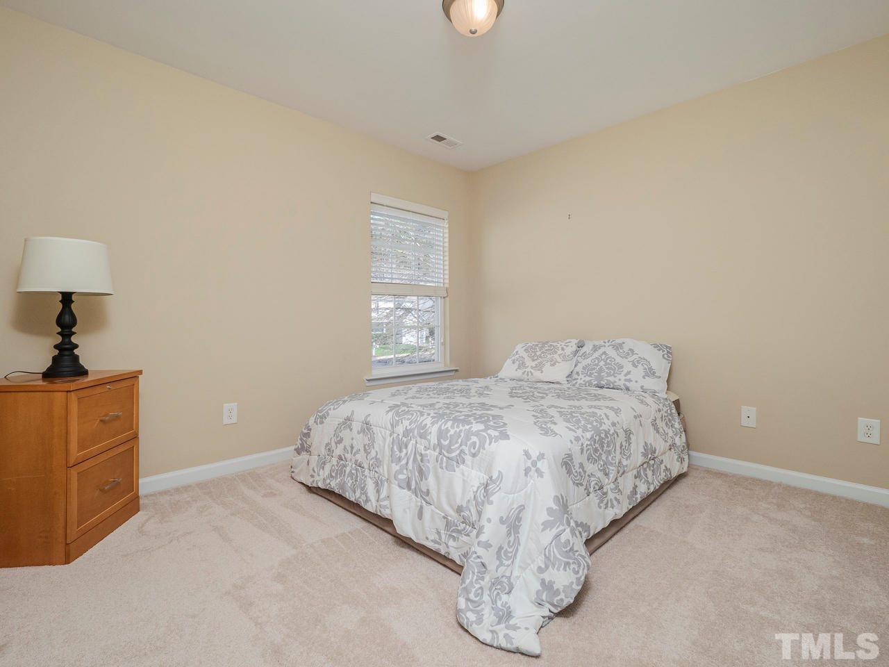 8429 Whisper Ridge Place Raleigh, NC 27613 - Photo 20 of 27 Nice sized closets in each secondary bedroom