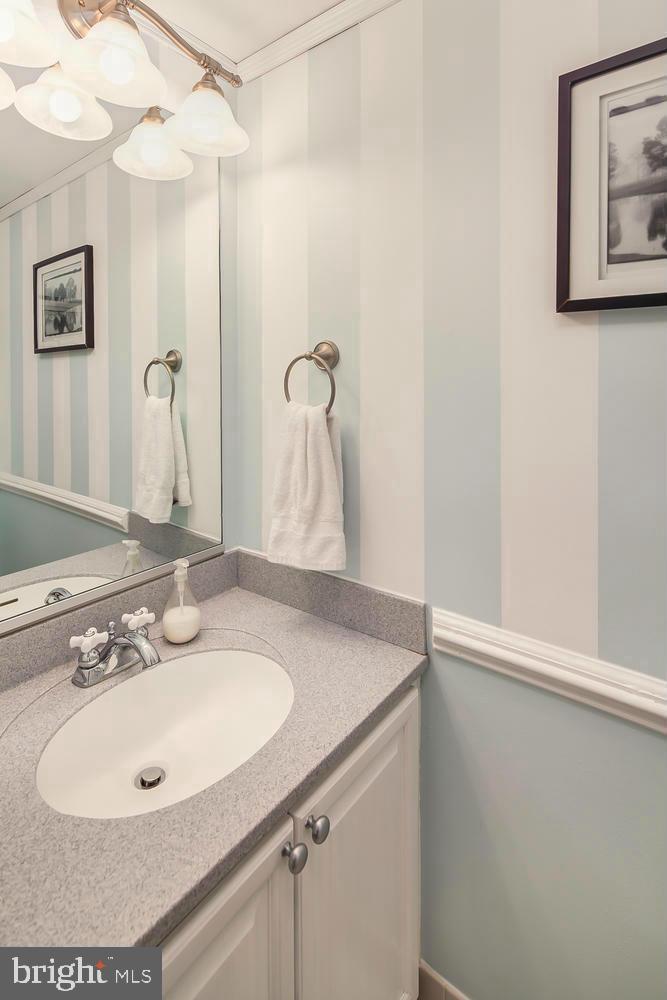 545 East Braddock Road, Unit 101 Alexandria, VA 22314 - Photo 41 of 46 Charming bathroom with soft hues.