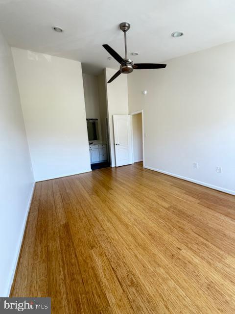 8399 Montgomery Run Road, Unit I Ellicott City, MD 21043 - Photo 18 of 26 a view of empty room with wooden floor